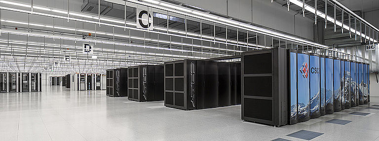 View of the machine room with cooling islands and the Piz Daint supercomputer on the right.